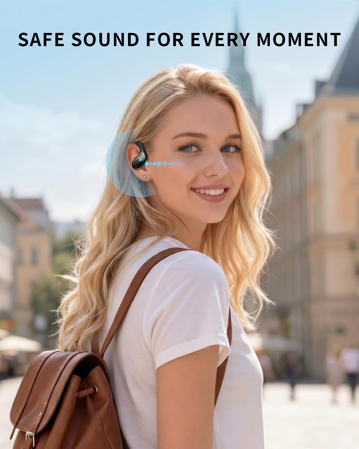 Woman wearing a BX30 earbud while walking outside